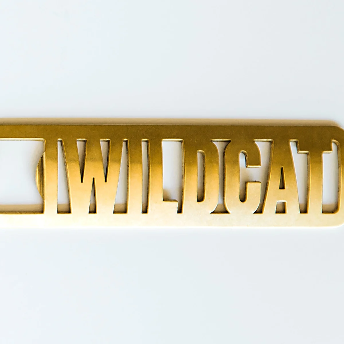 Outstanding Wildcat Brass Bottle Opener Natural