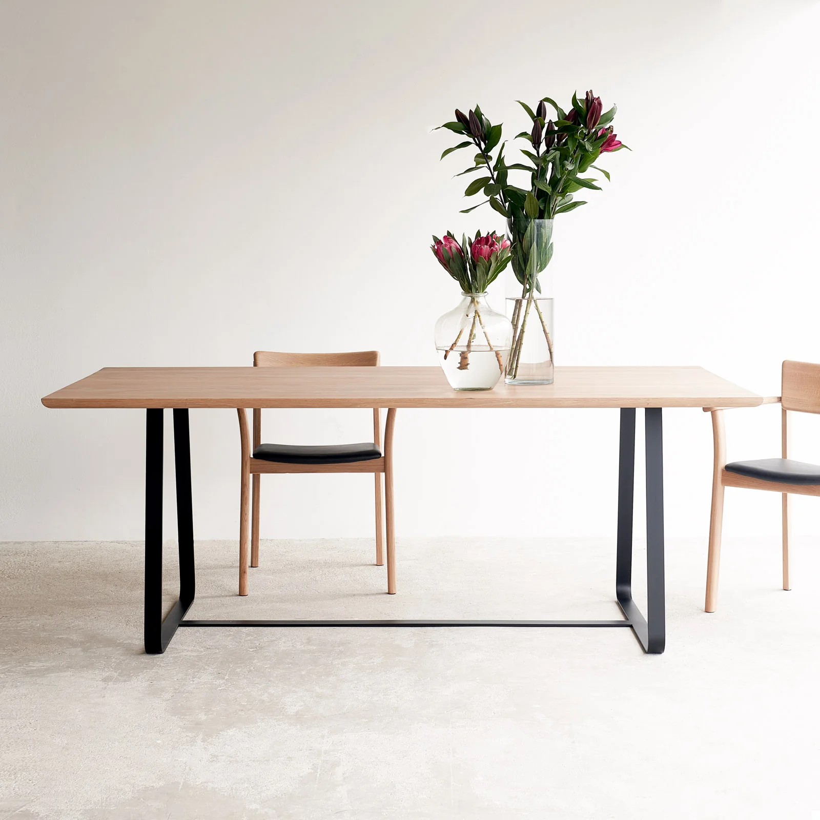 Easy-to-Use Dining Table Oak with Black Sleigh Base 220cm Next-Generation