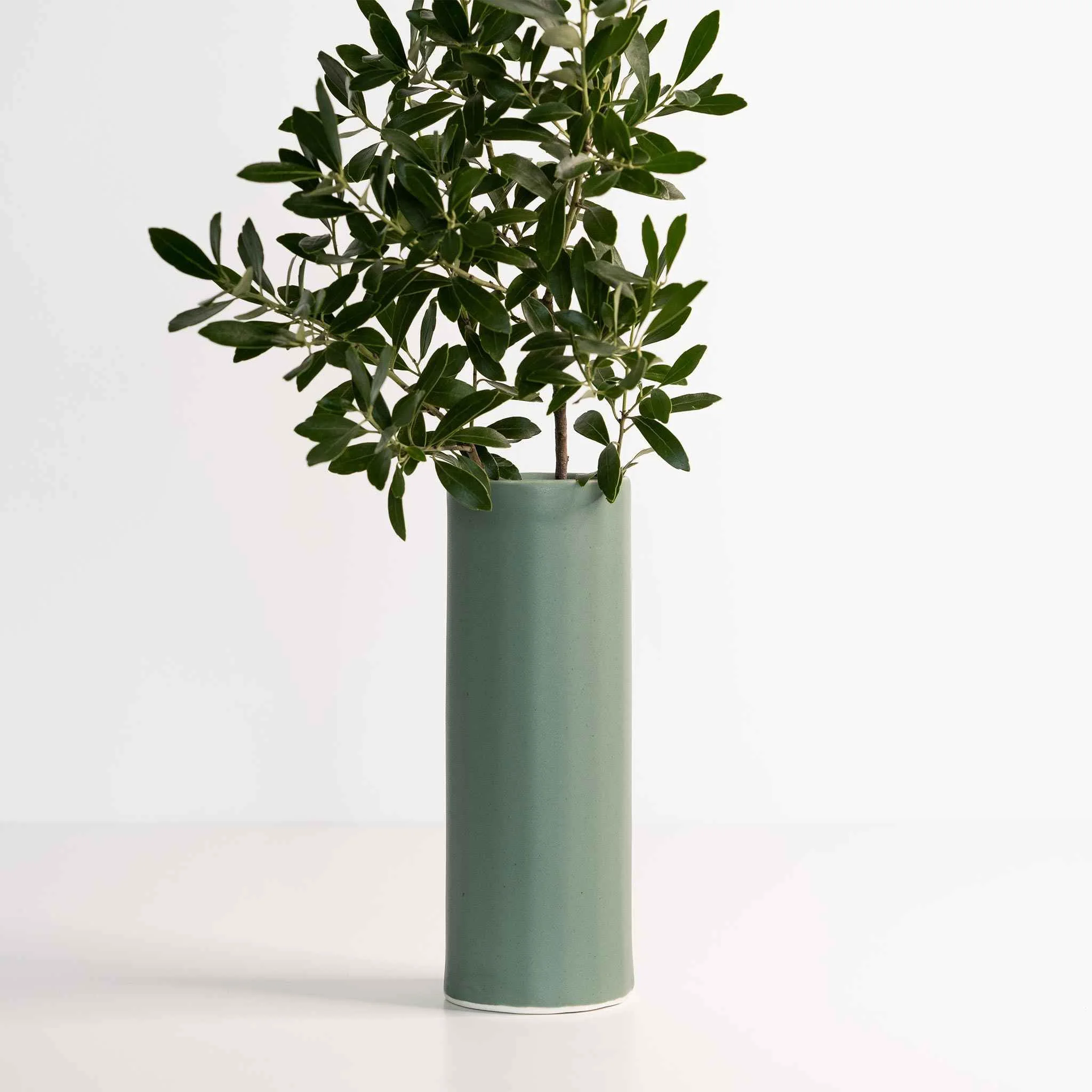 Functional Bloom Vase – Handmade Porcelain Flower VaseModern Handmade Porcelain Flower Vase by Ember Collective Lightweight
